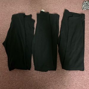 three pairs of garage leggings